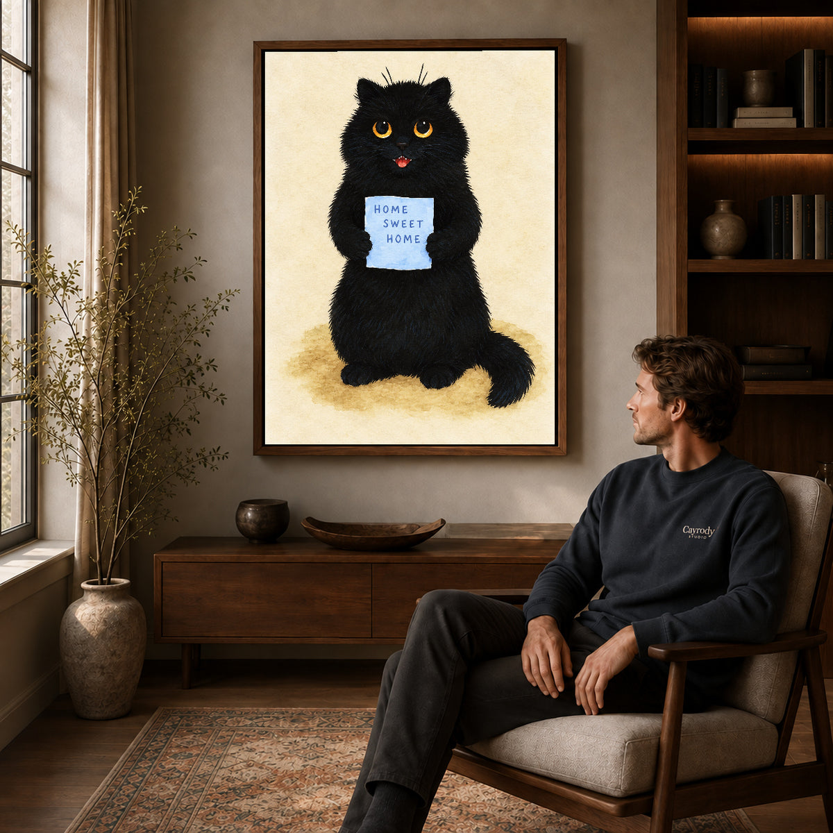 Walnut framed home sweet cat artwork above a seated man in a wood furnished living room.