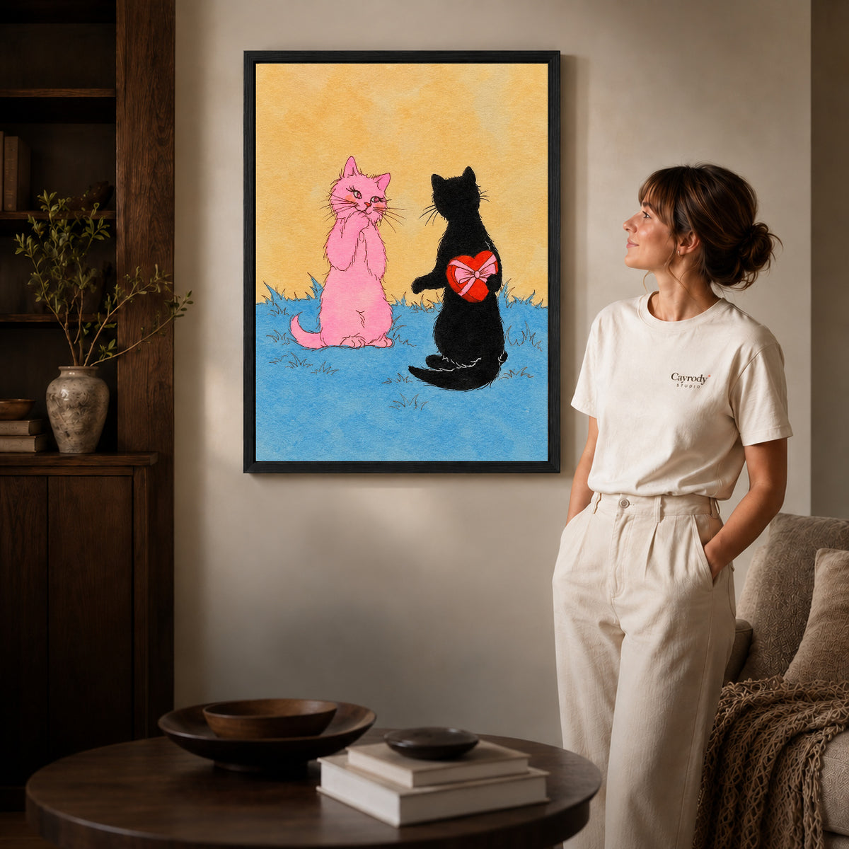 Black framed hidden heart cat artwork scene assigned to all six black framed canvas sizes.
