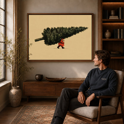 Walnut framed santa giant tree artwork above a seated man in a wood furnished living room.