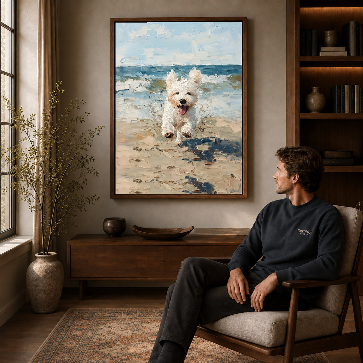 Walnut framed seaside jumping puppy artwork above a seated man in a wood furnished living room.