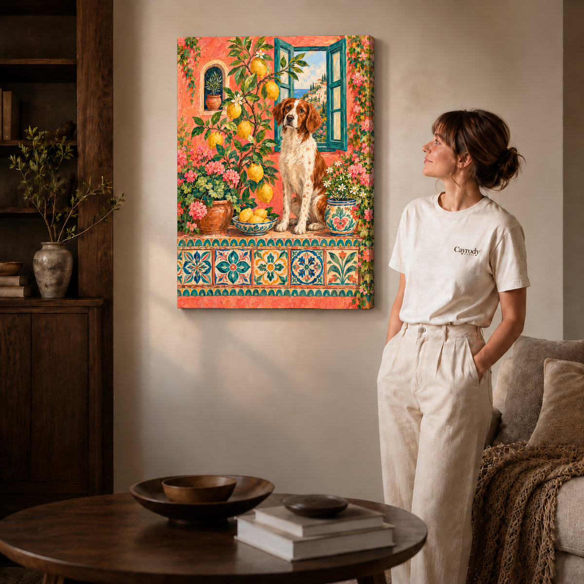 Gallery wrapped lemon garden spaniel artwork with shaded canvas edges beside a woman wearing cream clothing.