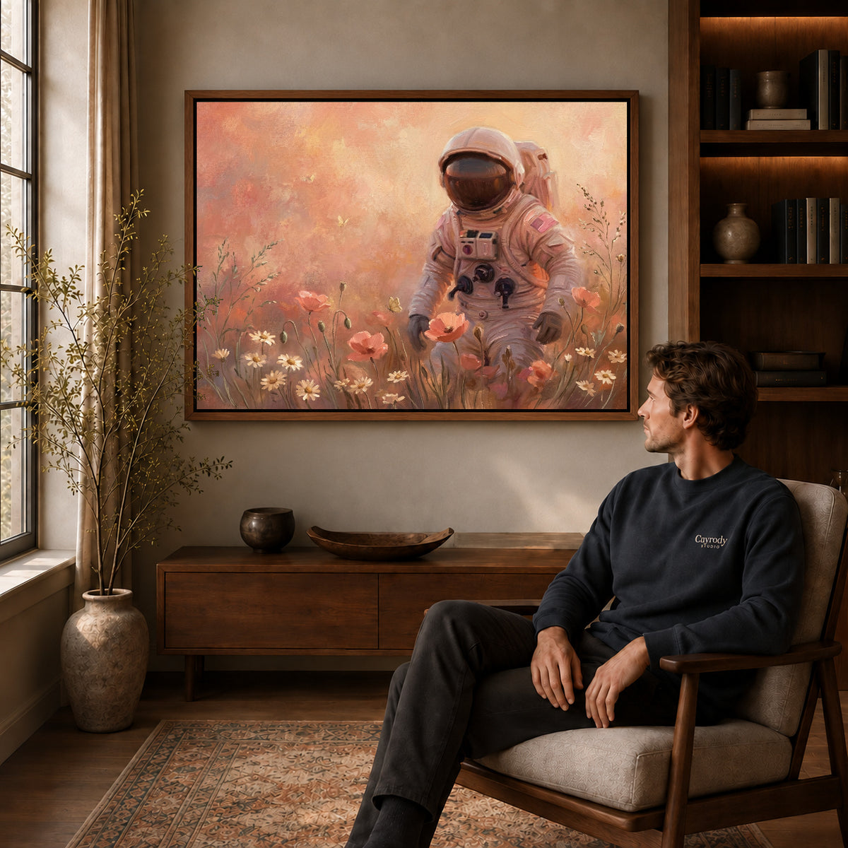 Walnut framed astronaut flower walk artwork above a seated man in a wood furnished living room.