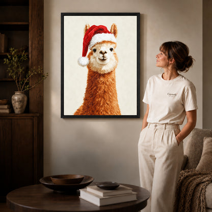 Black framed santa alpaca portrait artwork beside a woman in a warm neutral living room.