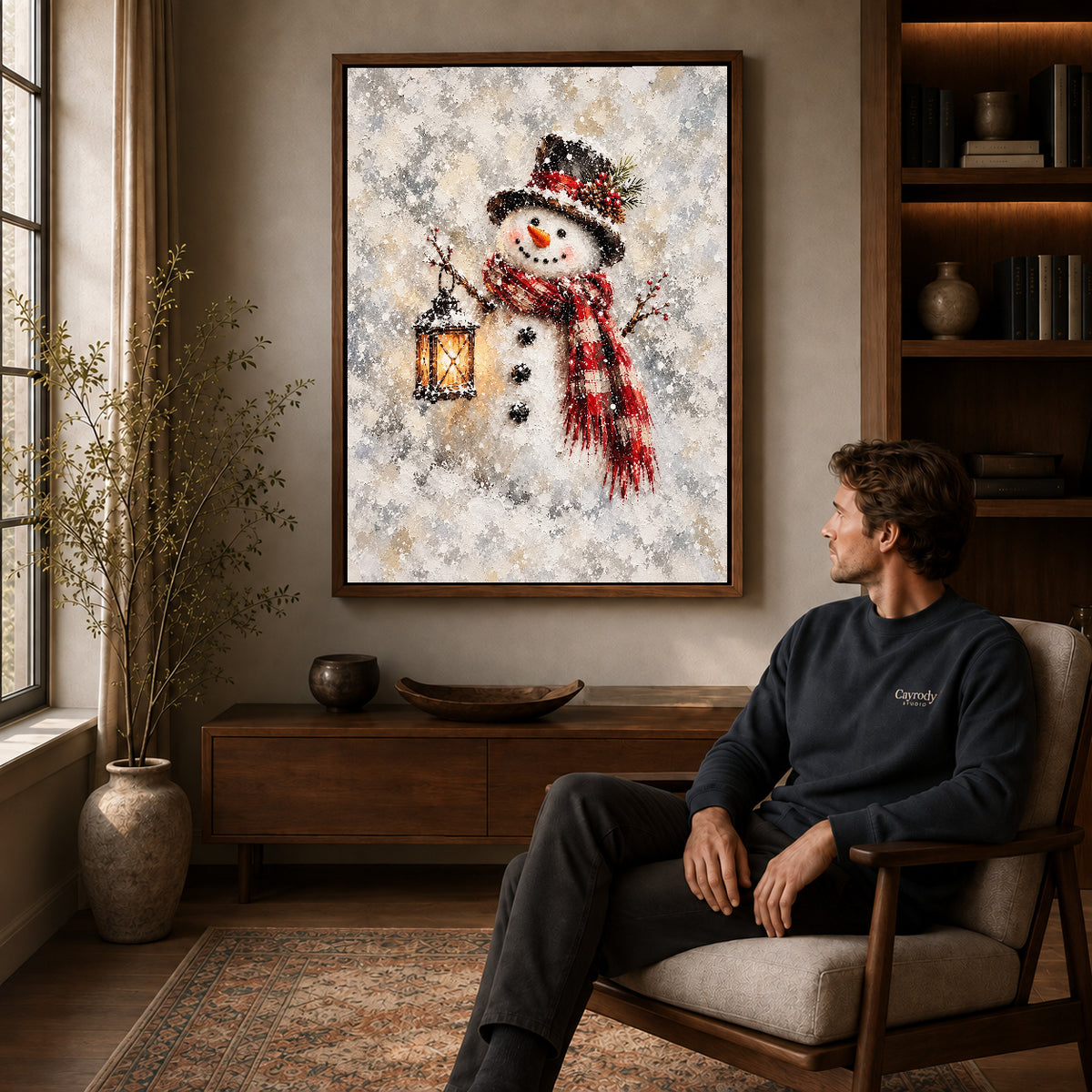 Walnut framed lantern snowman artwork above a seated man in a wood furnished living room.