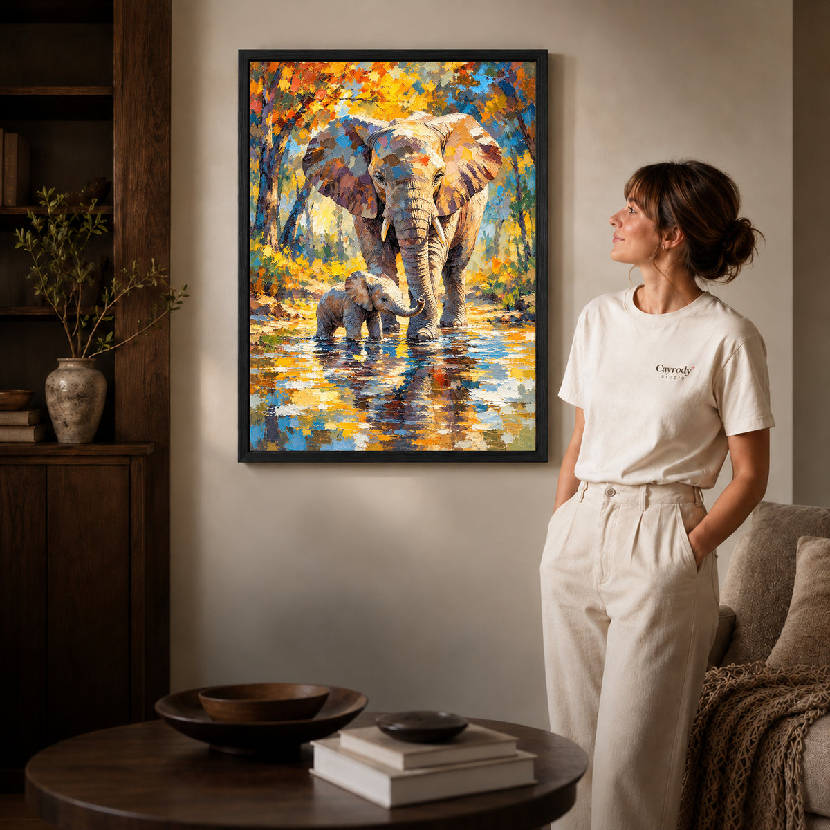 Black framed elephant family river artwork scene assigned to all six black framed canvas sizes.