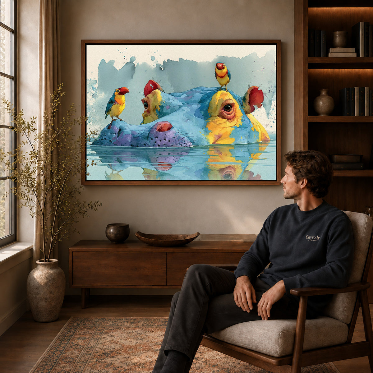 Walnut framed hippo bird friends artwork above a seated man in a wood furnished living room.