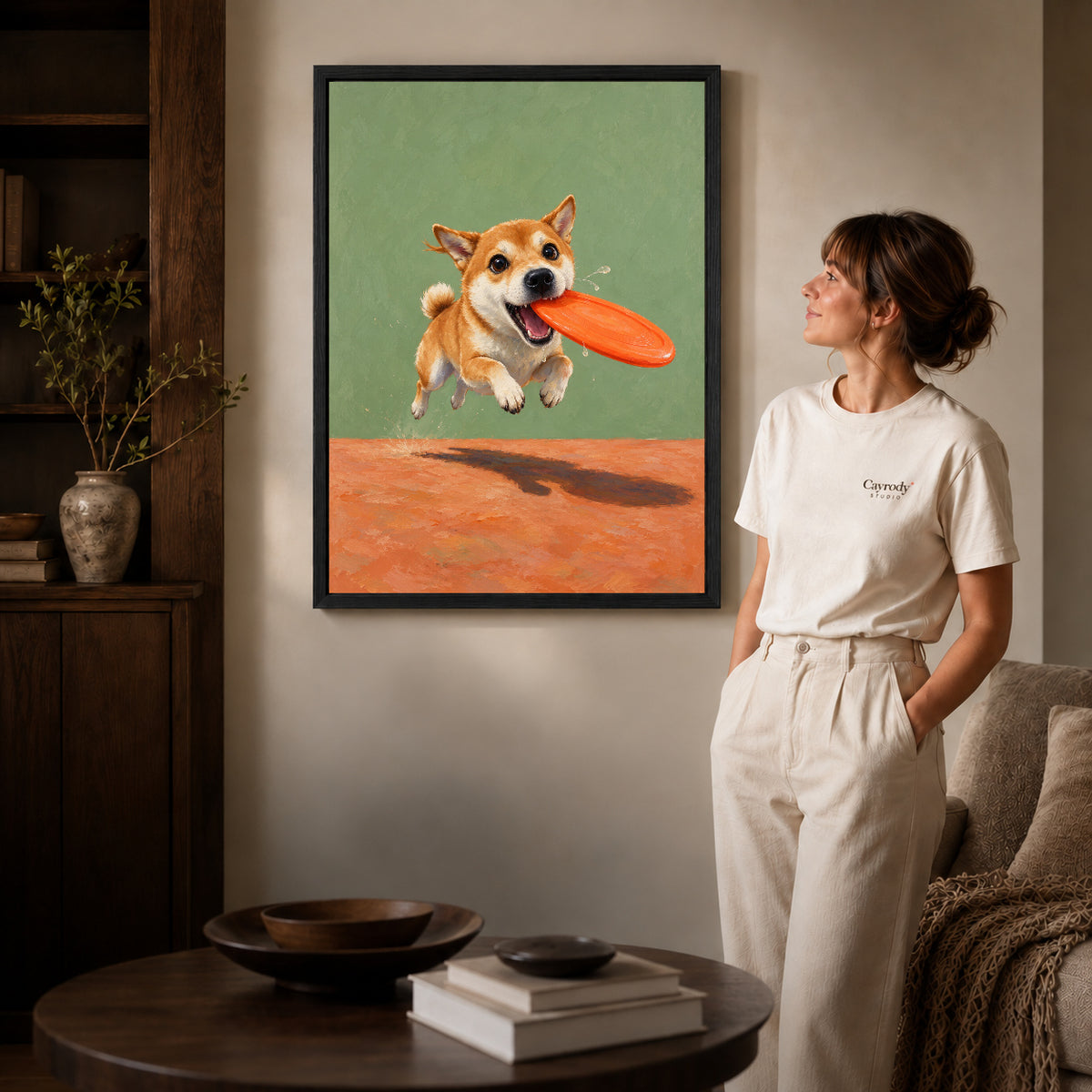 Black framed flying disc puppy artwork scene assigned to all six black framed canvas sizes.