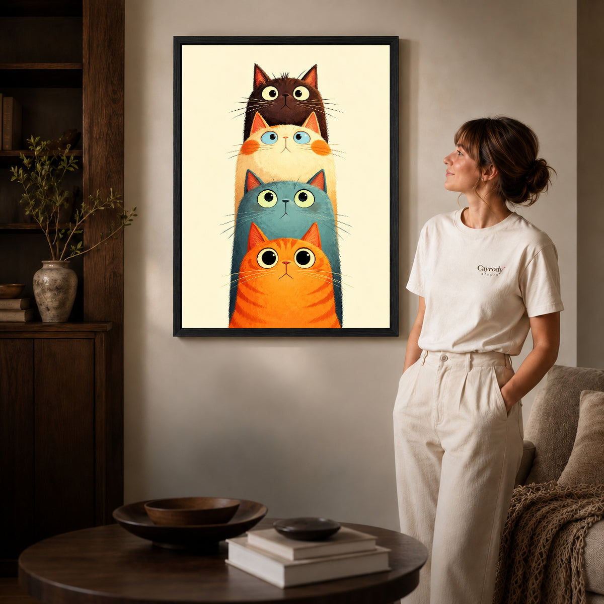 Black framed stacked curious cats artwork scene assigned to all six black framed canvas sizes.