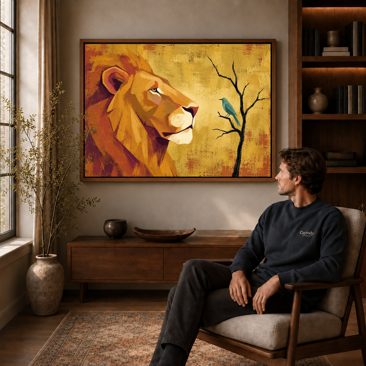 Walnut framed lion bird encounter artwork above a seated man in a wood furnished living room.