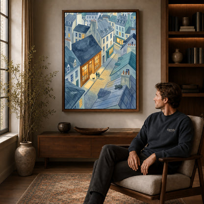 Walnut framed blue rooftop evening artwork above a seated man in a wood furnished living room.
