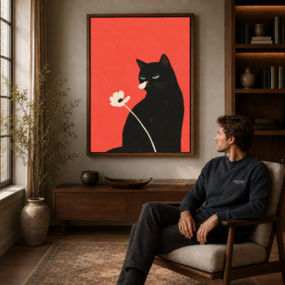 Walnut framed black cat flower canvas art displayed above a seated man in a wood furnished living room.
