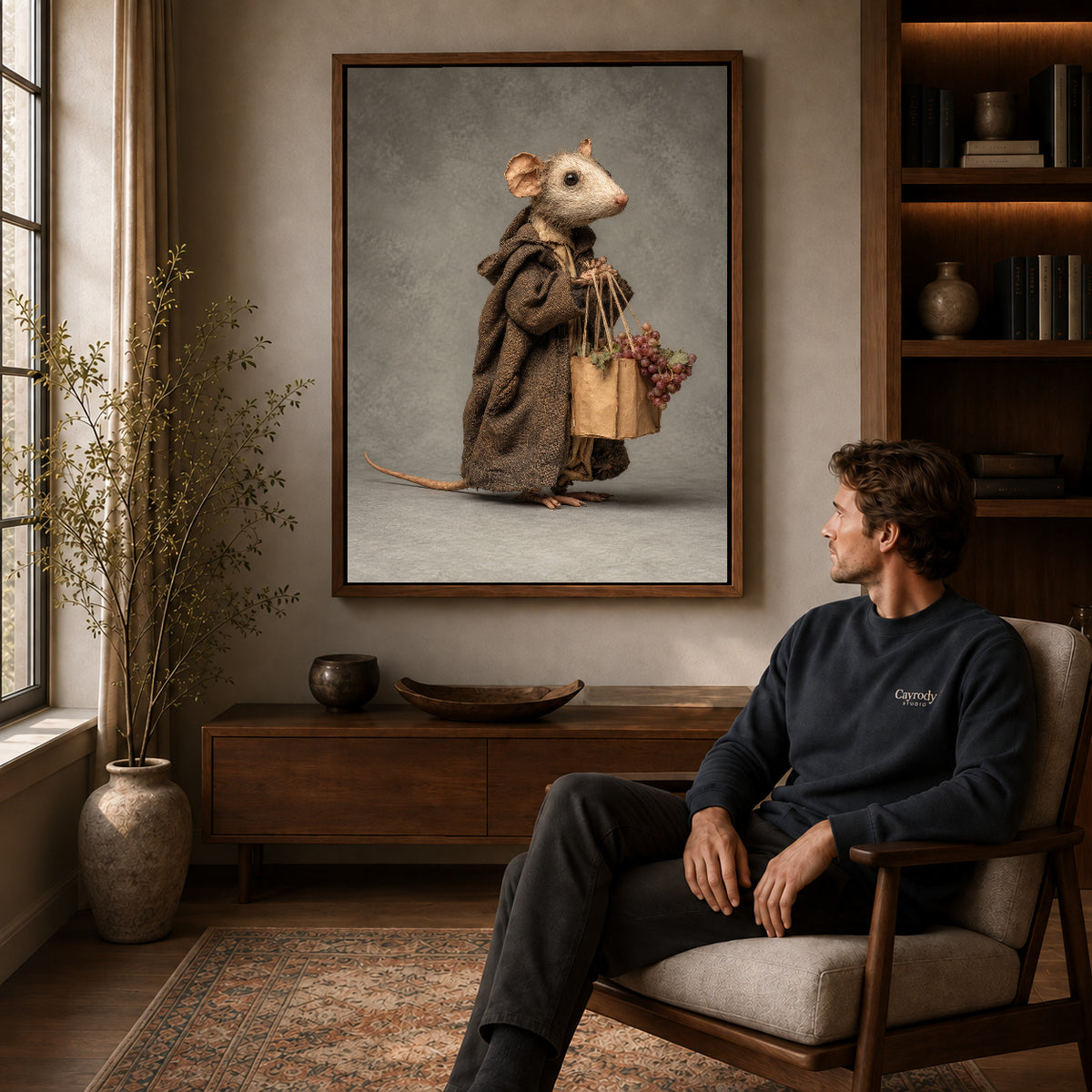 Walnut framed cloaked mouse errand artwork above a seated man in a wood furnished living room.