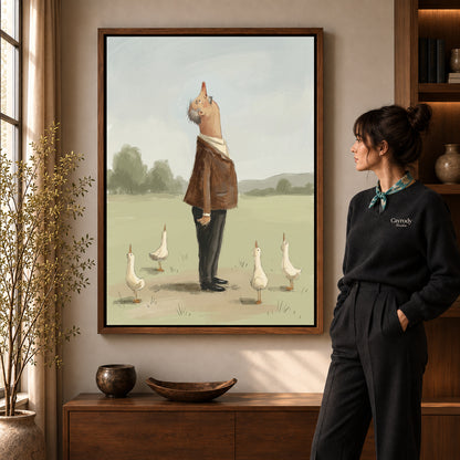Skyward Goose Company artwork in a walnut frame beside a standing woman in a warm room.