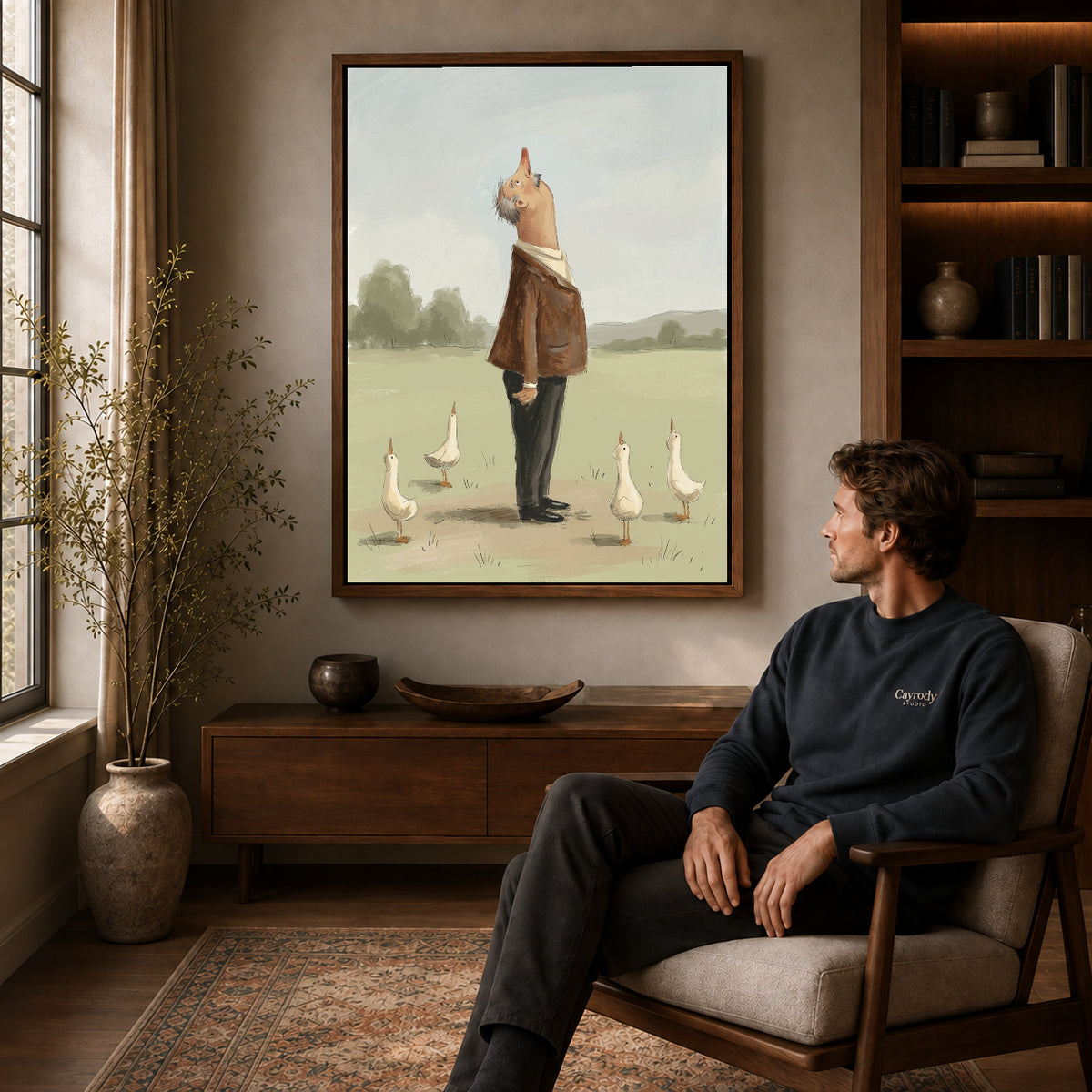 Walnut framed skyward goose company artwork above a seated man in a wood furnished living room.