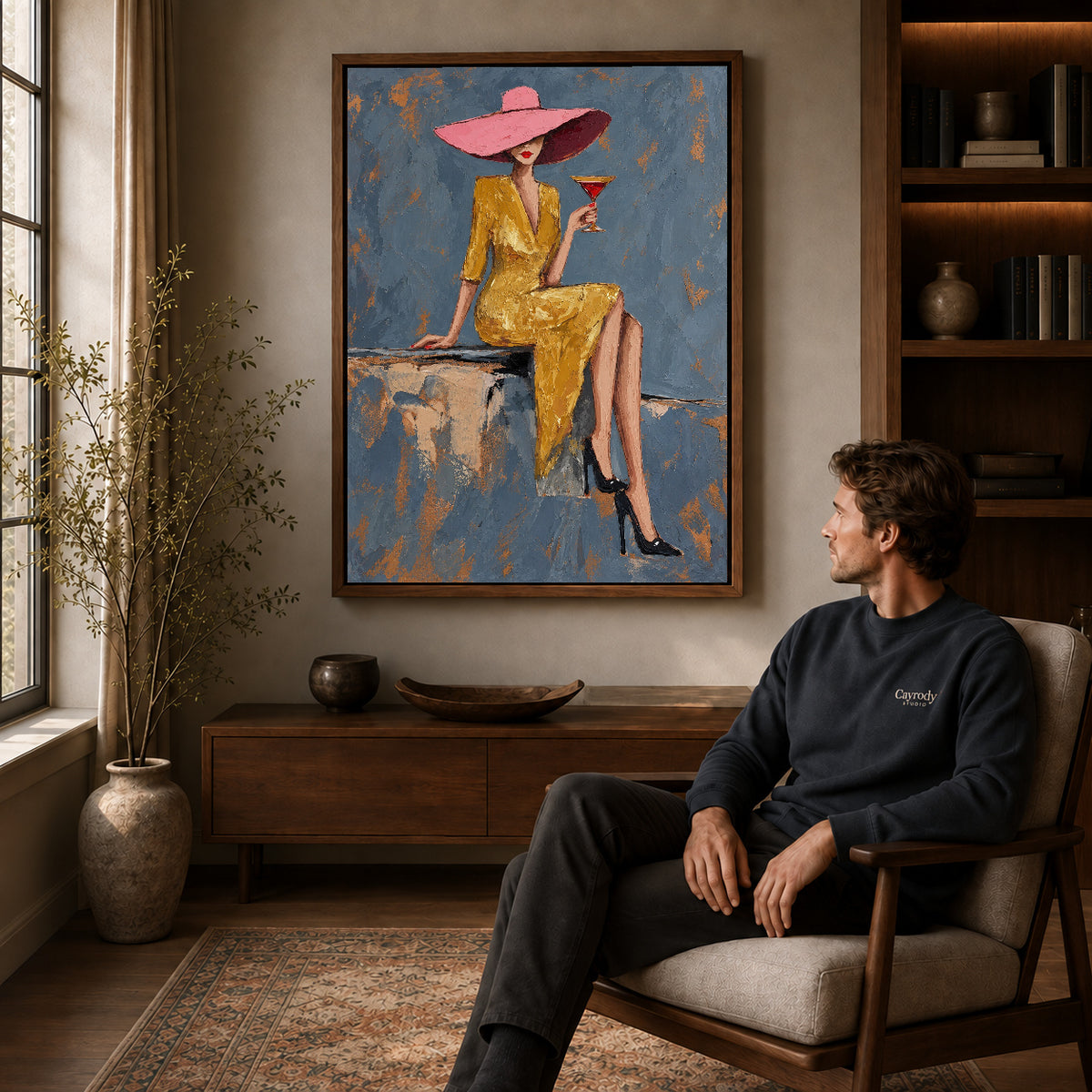 Walnut framed pink hat elegance artwork above a seated man in a wood furnished living room.