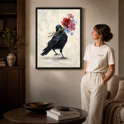 Black framed flower carrying crow artwork beside a woman in a warm neutral living room.