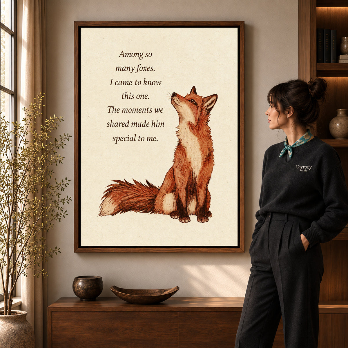 Special Fox Friendship artwork in a walnut frame beside a standing woman in a warm room.