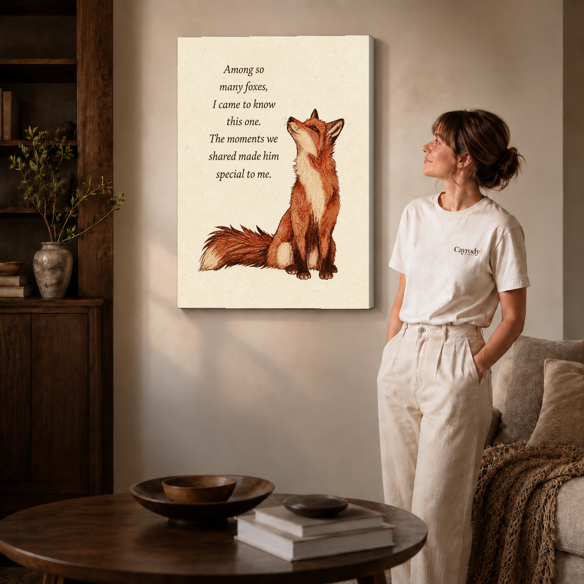 Gallery wrapped special fox friendship artwork with shaded canvas edges beside a woman wearing cream clothing.