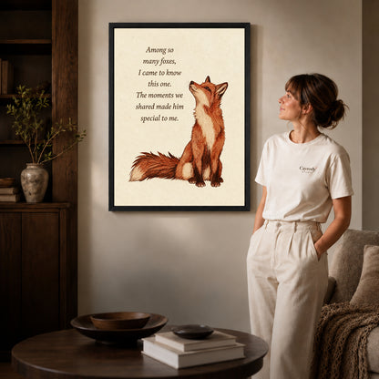 Black framed special fox friendship artwork beside a woman in a warm neutral living room.