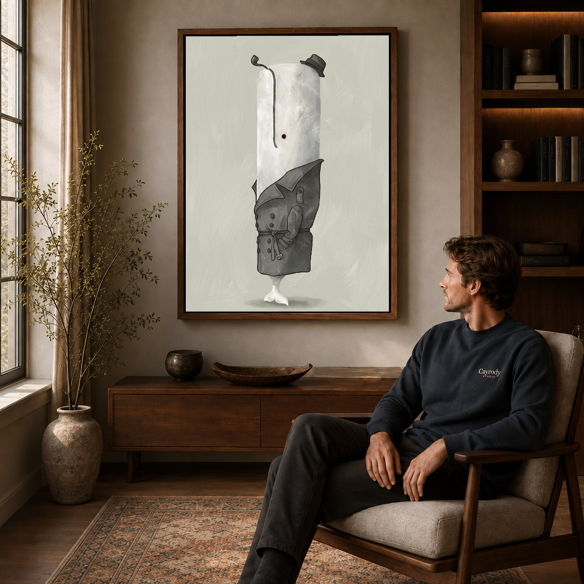 Walnut framed whale detective portrait artwork above a seated man in a wood furnished living room.