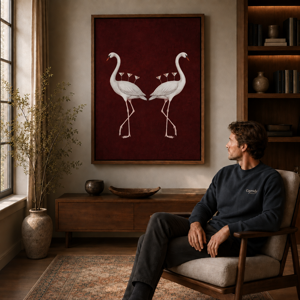 Pair of flamingos canvas art above a seated viewer in a cozy chair with bookshelves nearby.