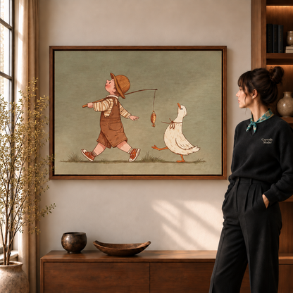 Boy and duck canvas wall art in a walnut frame above a console table