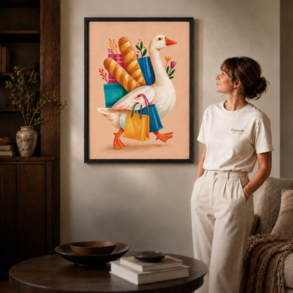 Woman viewing black-framed shopping goose wall art above a round coffee table.