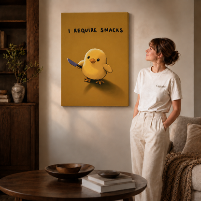 Unframed canvas showing a yellow chick and “I REQUIRE SNACKS” beside a woman.