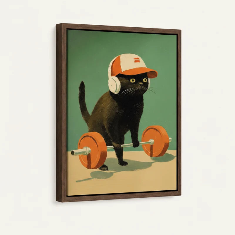 Close-up of gym cat framed canvas art with walnut floater frame on white wall